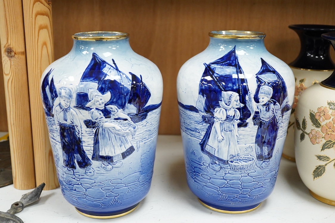 Three pairs of vases to include hexagonal Wilton ware and Delft blue and white, largest 26cm high
